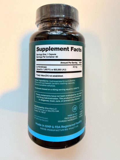 Etta Vita Lumbrokinase slow-release capsules displayed next to the authentic product packaging