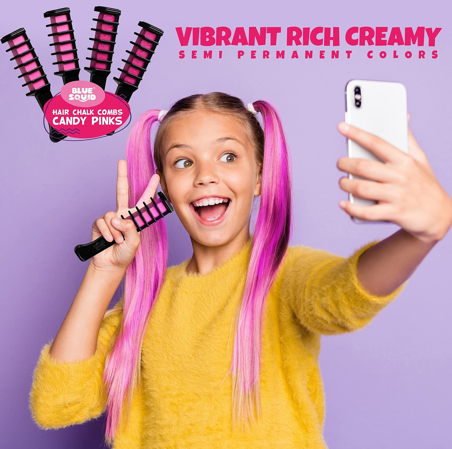 Two-tone candy pink hair chalk comb applicators laid out on a clean white surface.