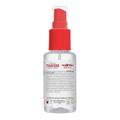 Travel-friendly Thayers toner mist size in hand for scale