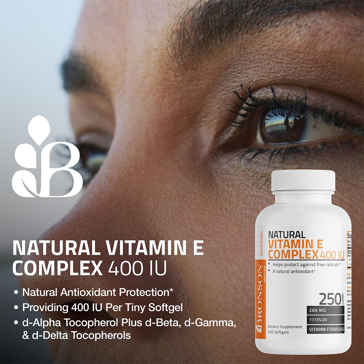 Side profile of Bronson Vitamin E 400 IU bottle listing manufacturing details and daily values