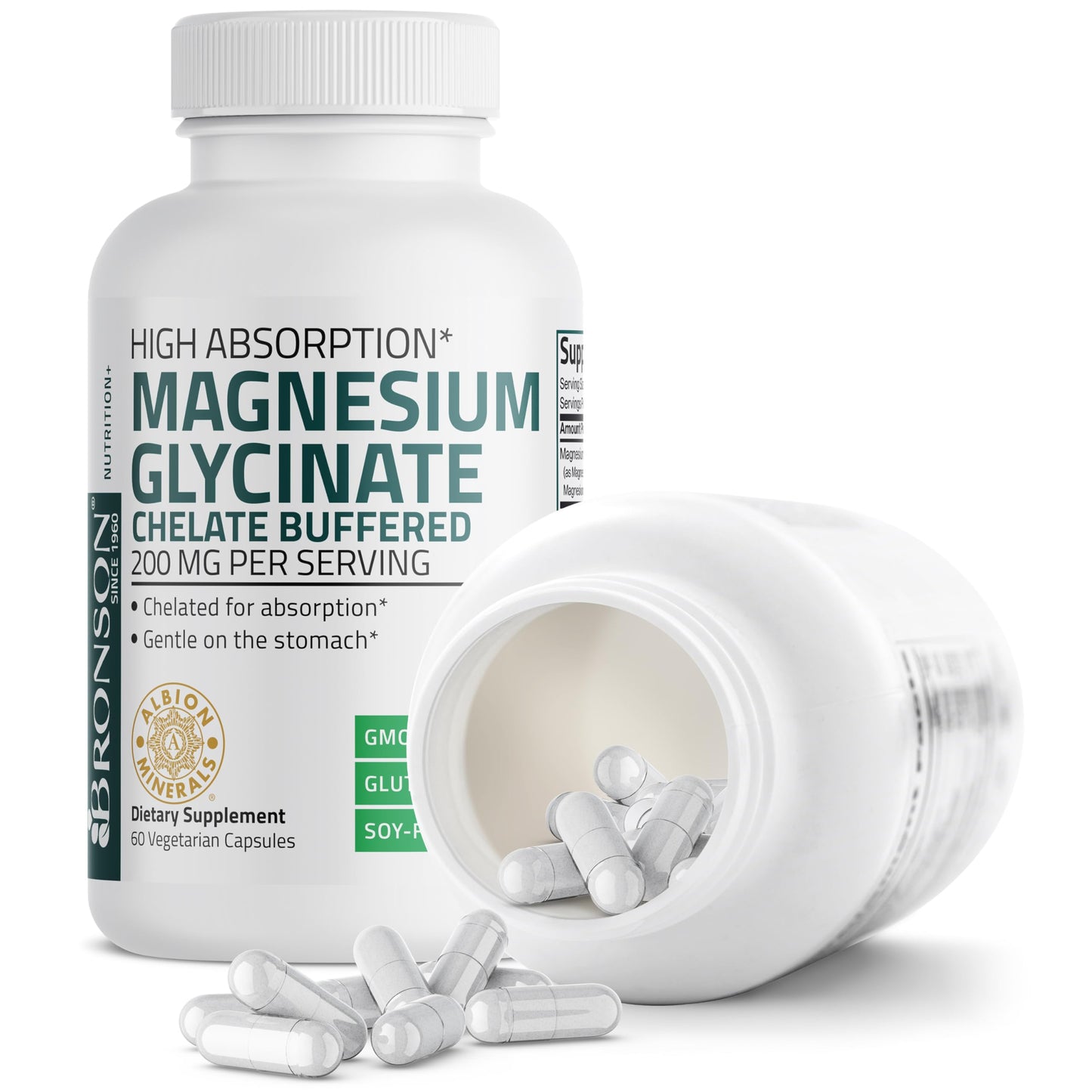 Two vegetarian capsules of Bronson chelated magnesium displayed next to the bottle
