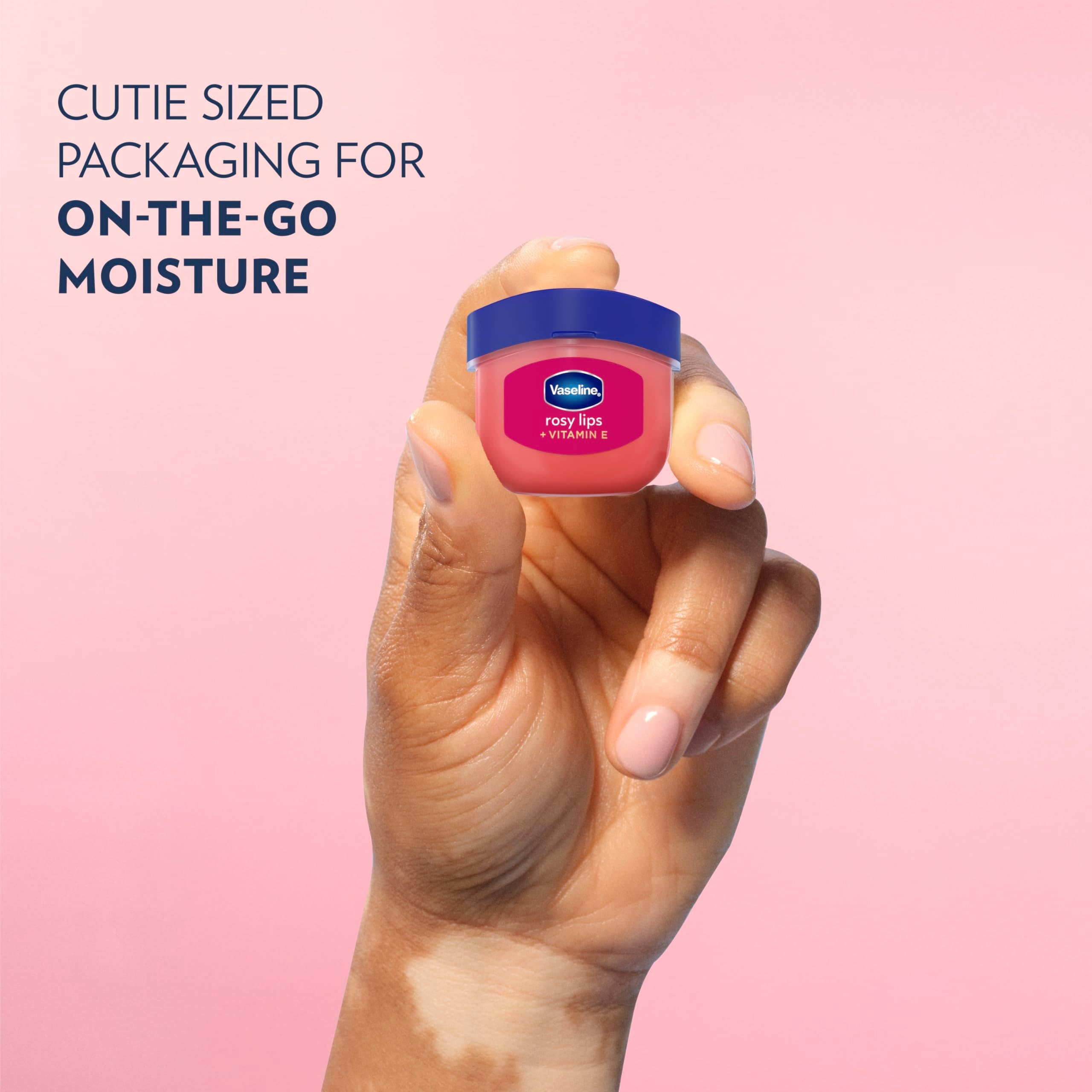 Open Vaseline Lip Therapy tin showcasing rosy tinted balm