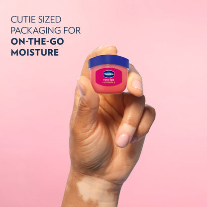 Open Vaseline Lip Therapy tin showcasing rosy tinted balm
