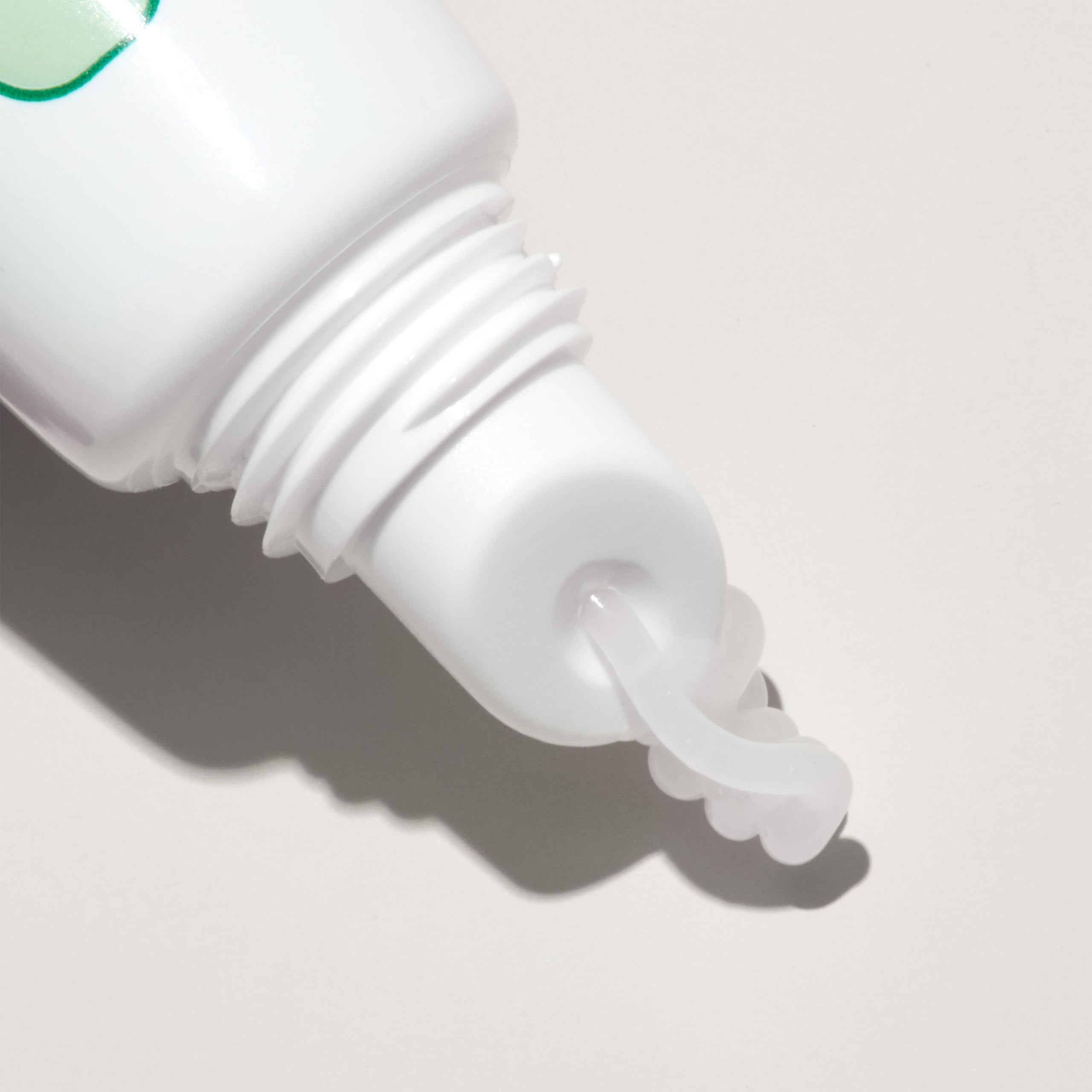 Mario Badescu lip balm applied to show smooth finish