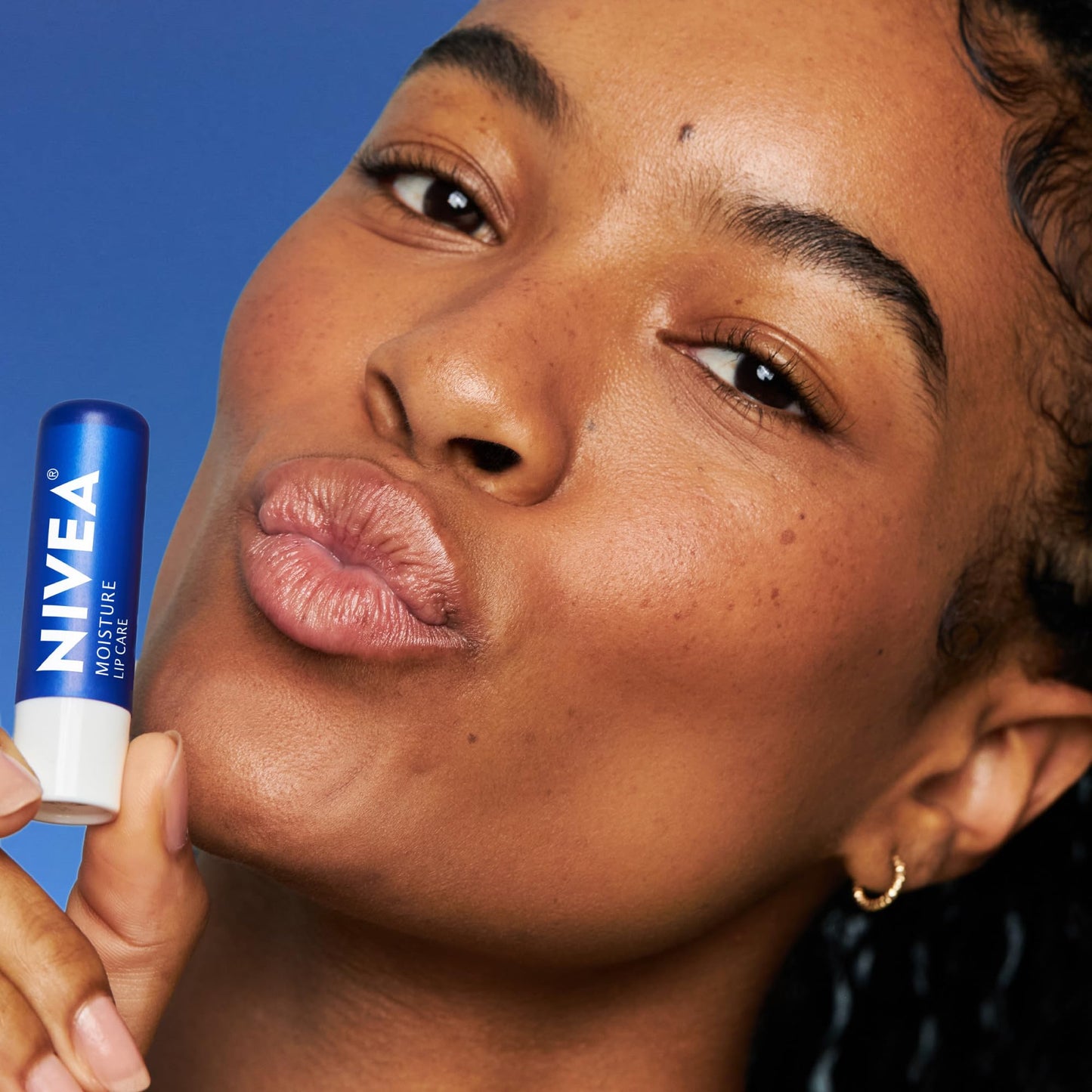 Nivea lip care stick cap removed showing balm