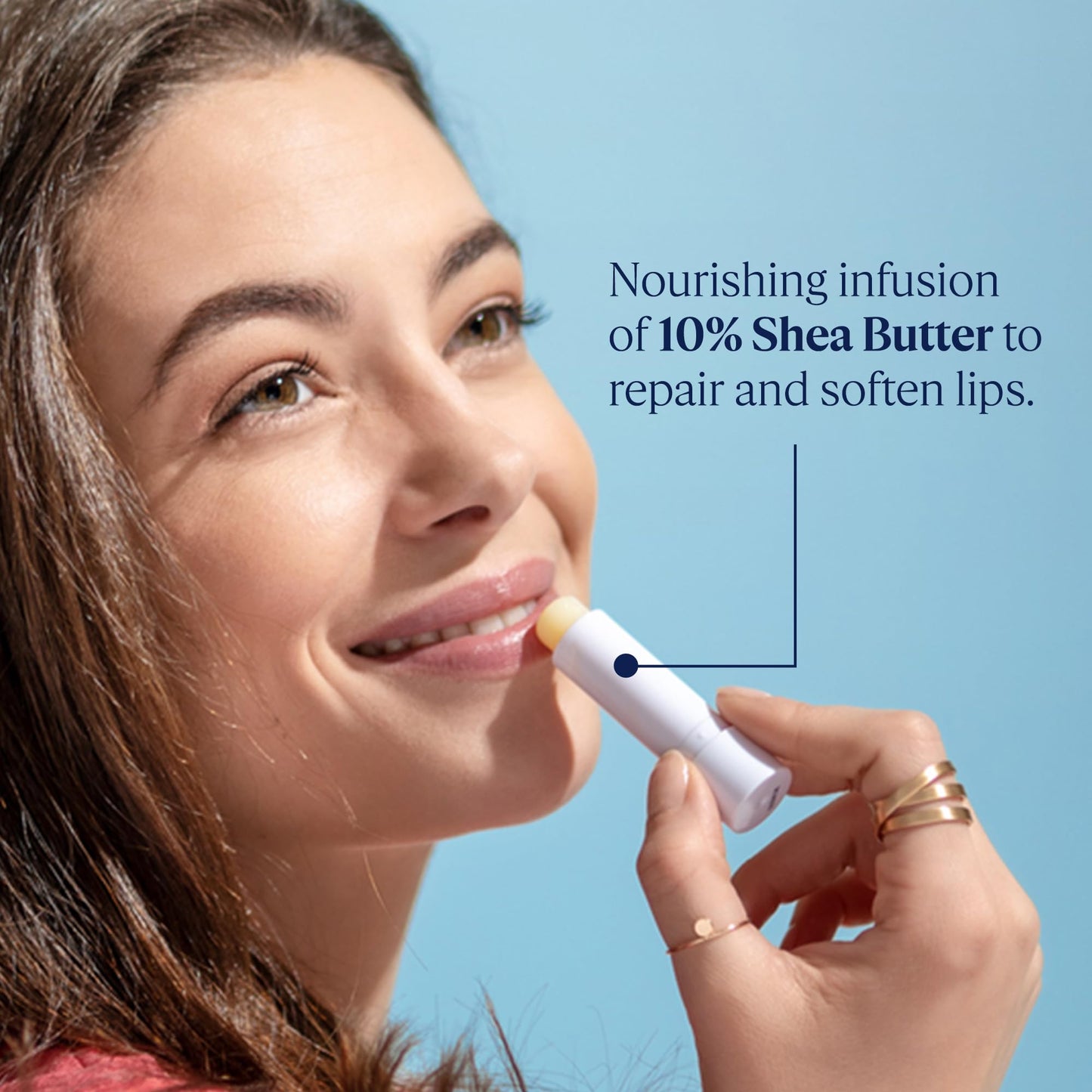 L'Occitane Shea Butter Lip Balm stick with cap off showing formula