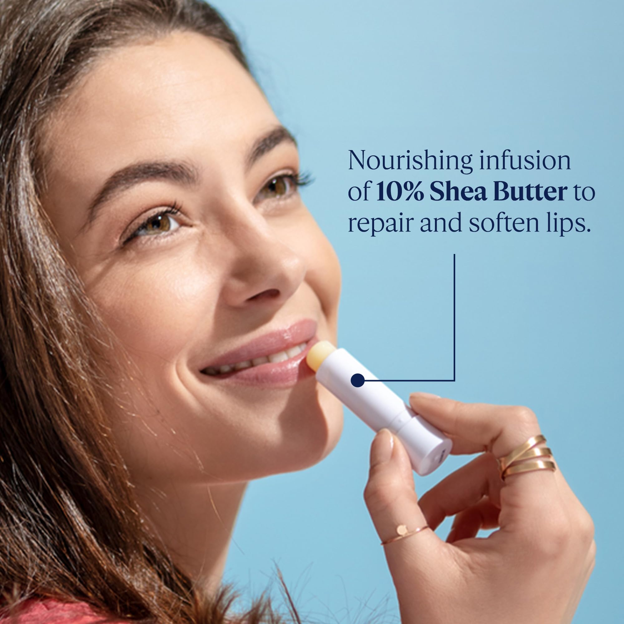 L'Occitane Shea Butter Lip Balm stick with cap off showing formula