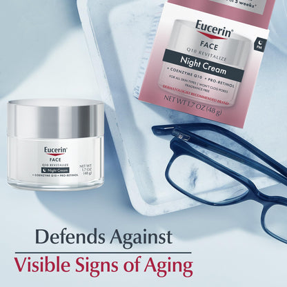 Eucerin Q10 Revitalize night cream jar placed next to its original protective outer carton