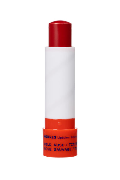 Close up of Korres tinted hydrating lip balm stick texture