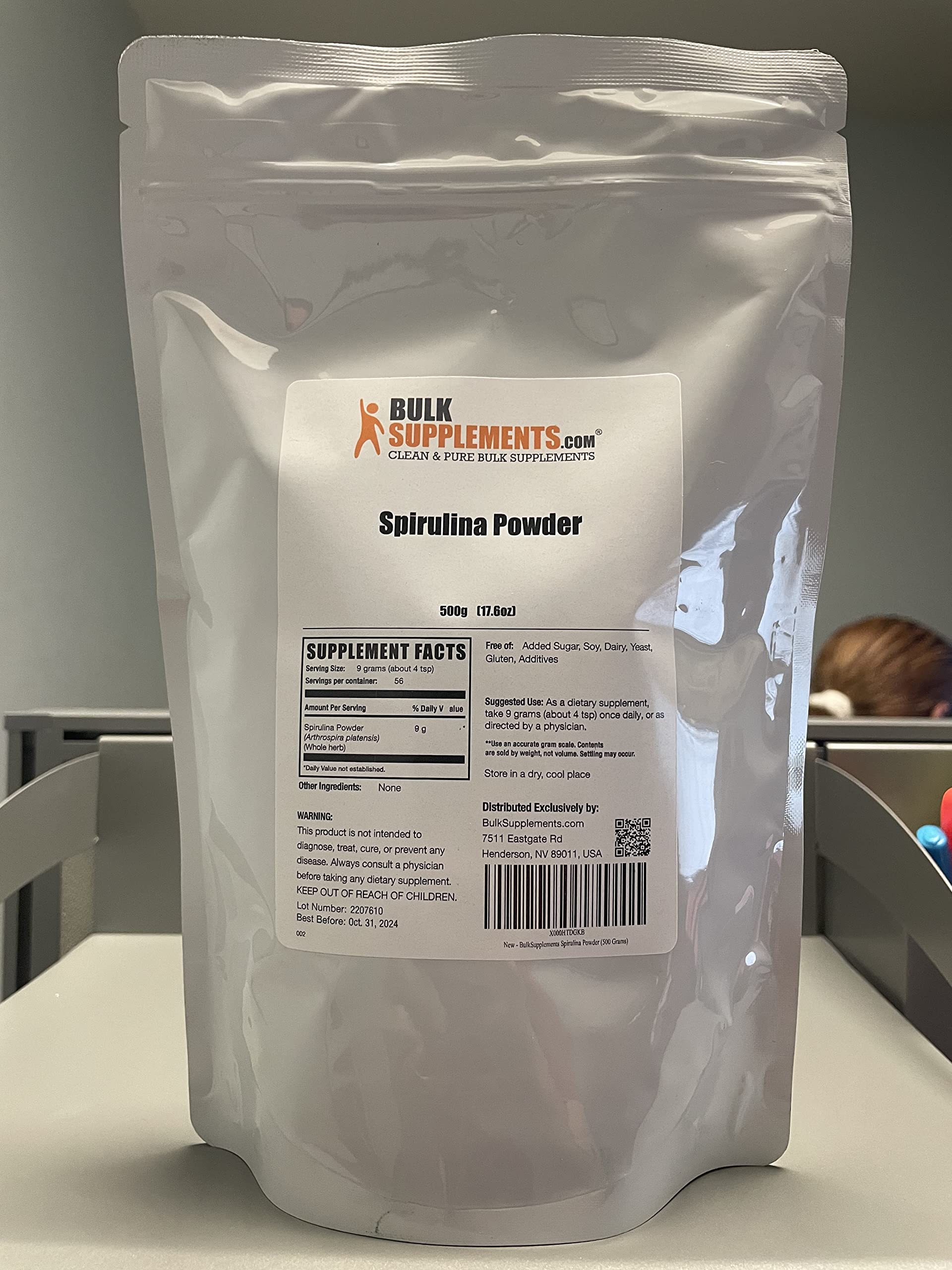 BulkSupplements Organic Spirulina Powder bag displaying nutrition facts and serving sizes for dietary green superfood.