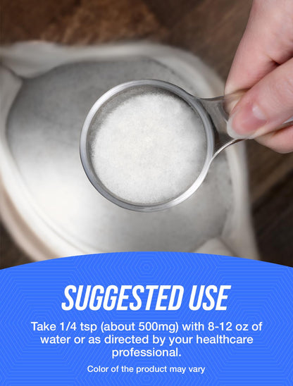 Close up of unflavored natural Vitamin E bulk supplement powder scoop demonstrating fine texture.