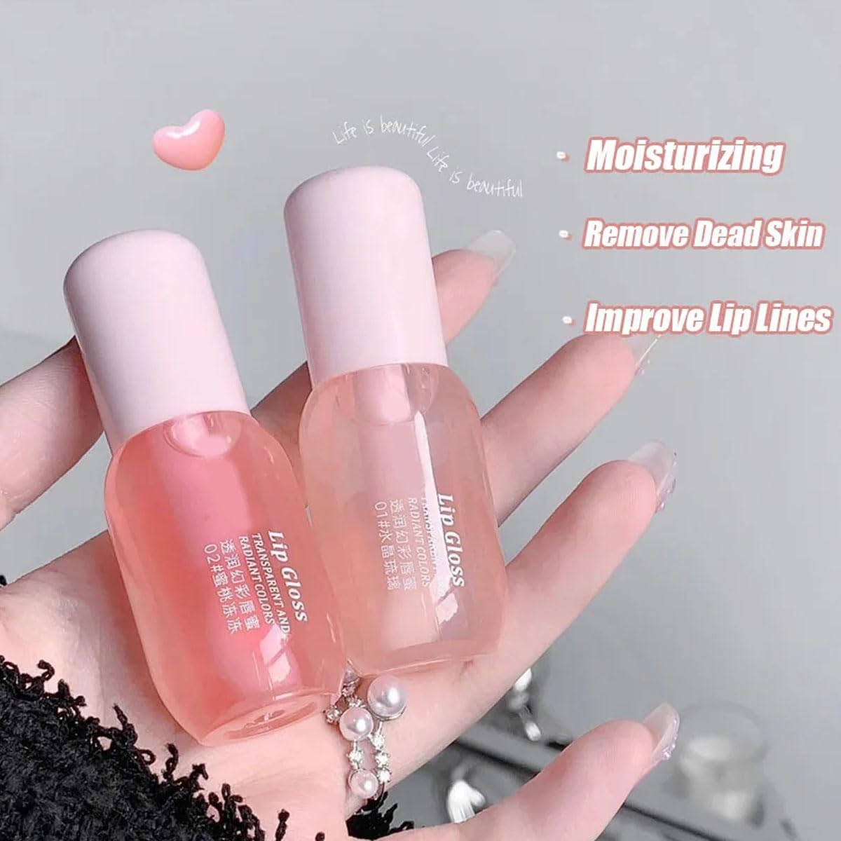 Three piece moisturizing lip treatment set in clear bottles