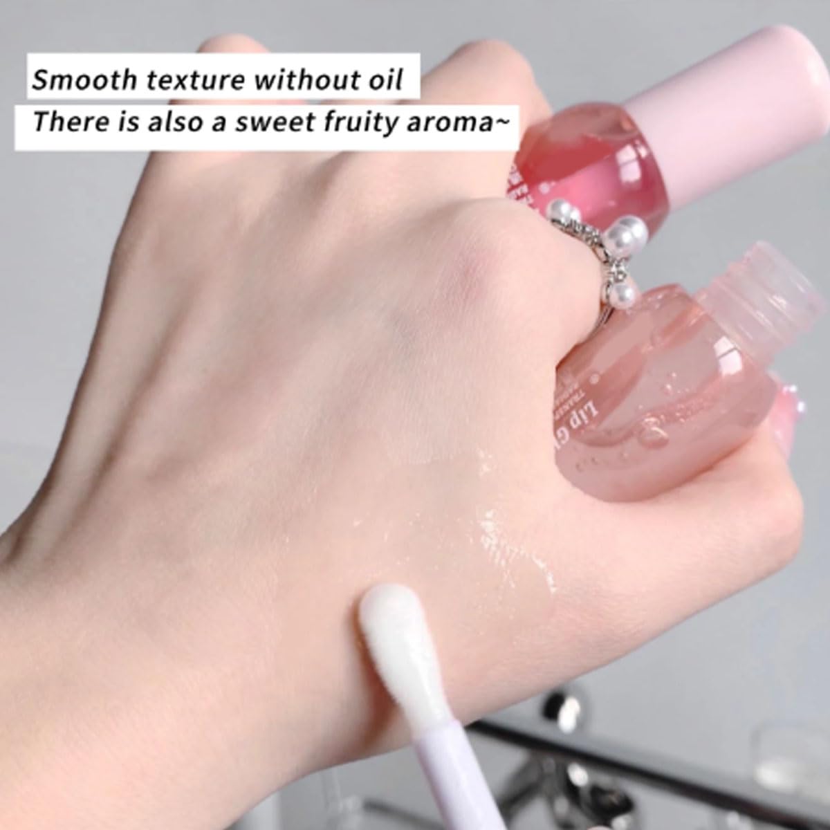 Generic lip oil set with crystal shine finish on white background