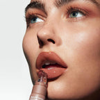 Kylie Cosmetics Toasted Marshmallow lip butter applicator and sheer brown texture
