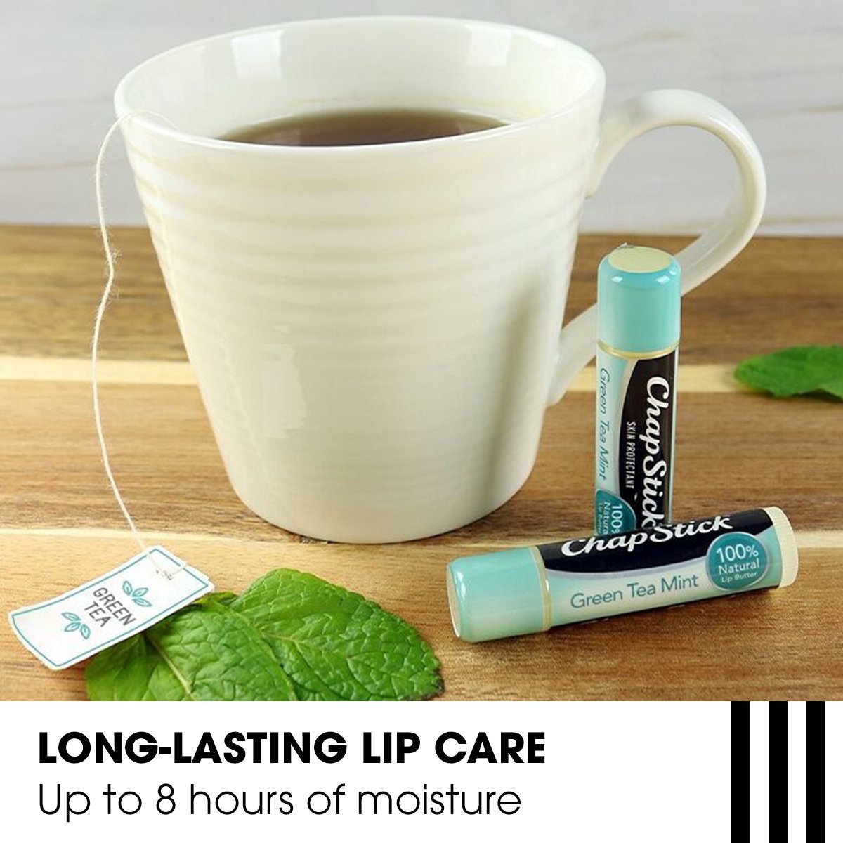 Close up view of the green tea mint flavored lip butter tube cap removed