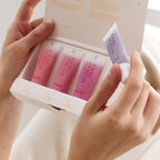 Open Pinkwonder Jojoba Lip Butter showing pigmented balm