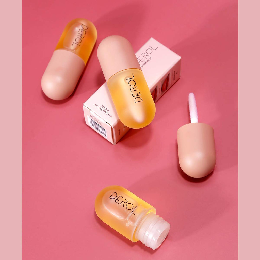 Anmansy Natural Lip Plumper bottle shown with natural ginger ingredients