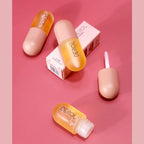 Anmansy Natural Lip Plumper bottle shown with natural ginger ingredients