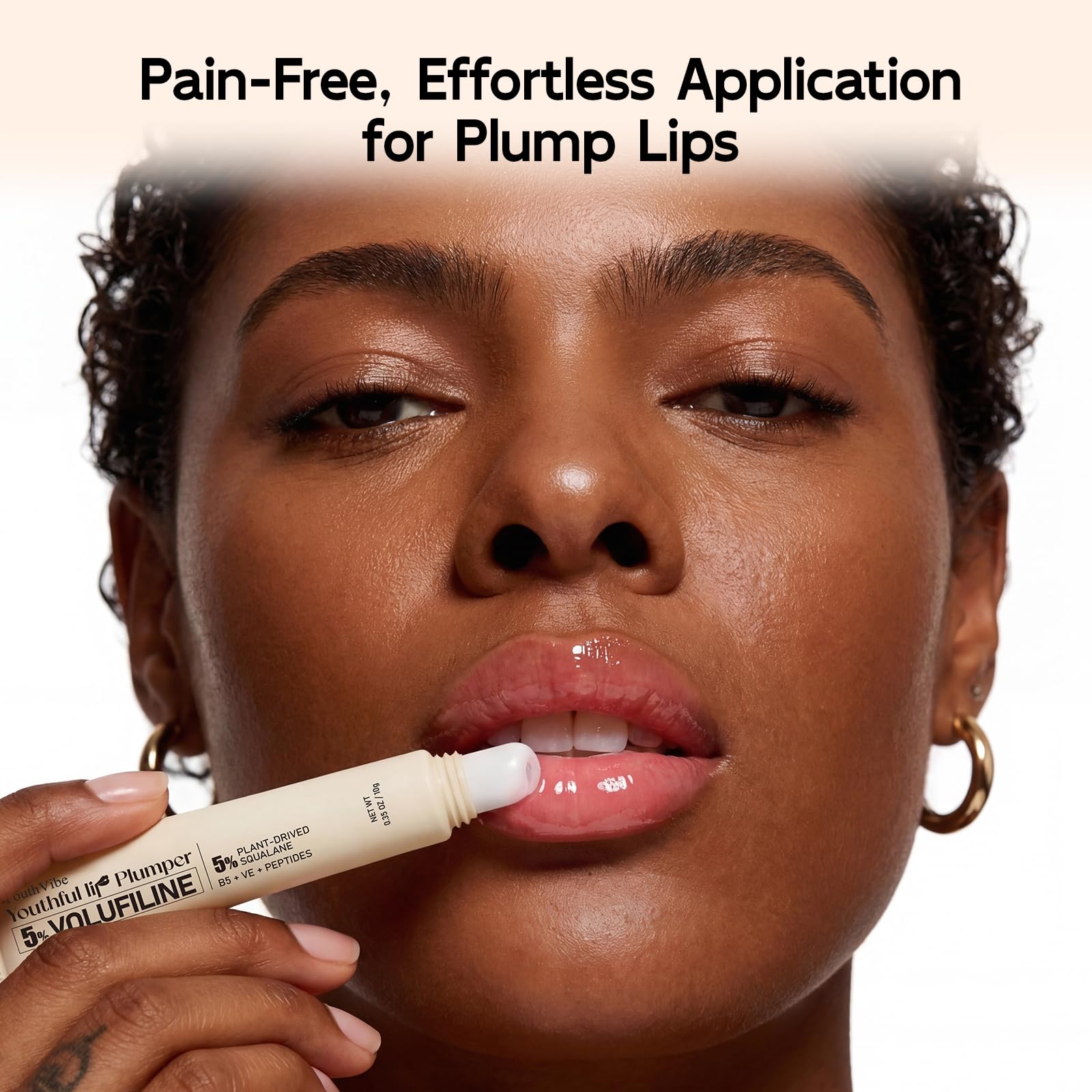 Model demonstrating the natural shine of YouthVibe lip plumper