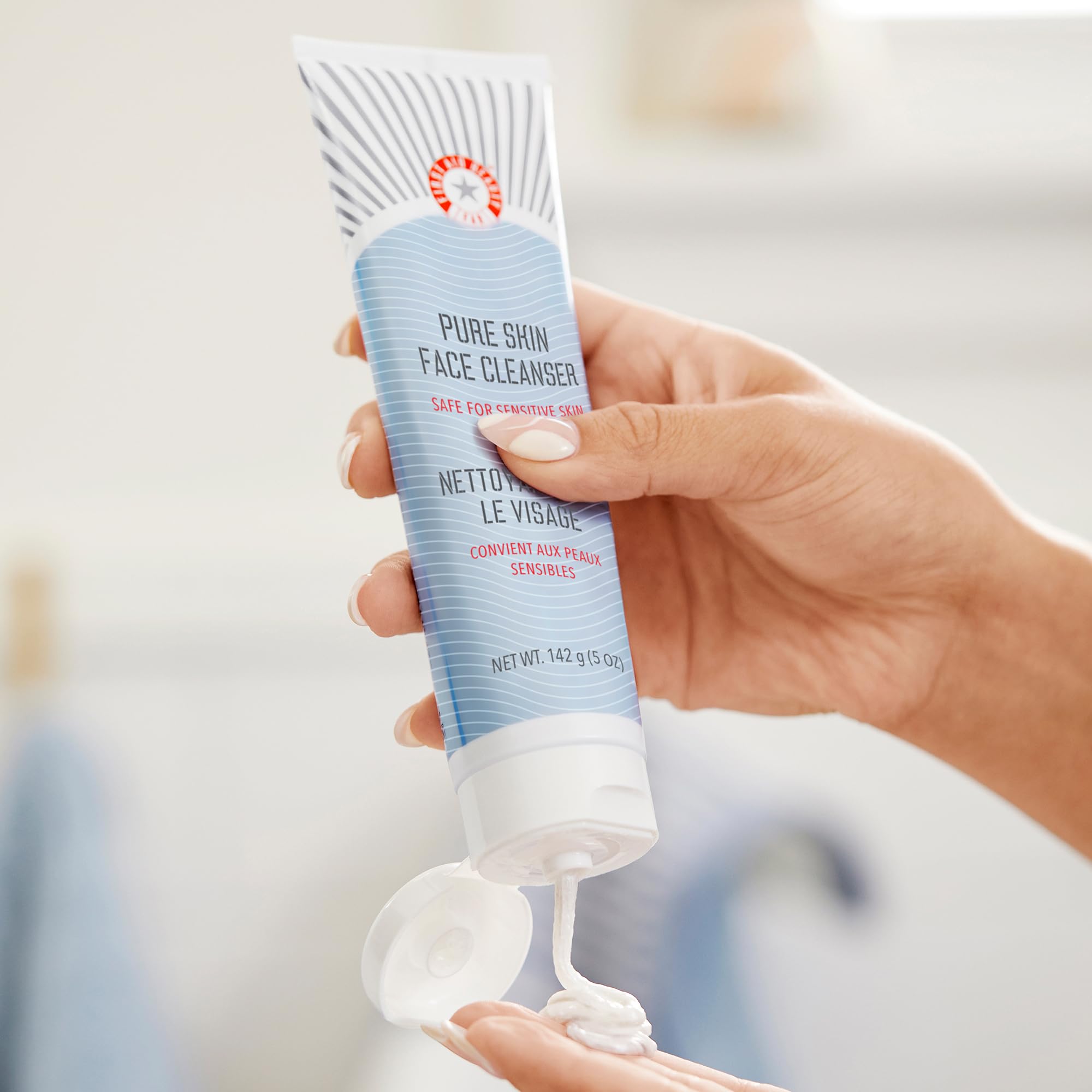 First Aid Beauty daily facial cleanser five ounce bottle showing product details