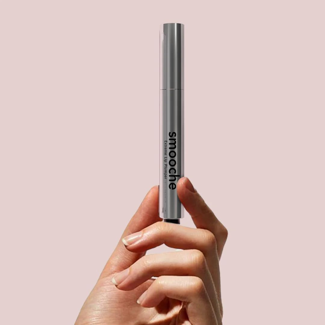 Lifestyle shot of Smooche Extreme Lip Plumper tube