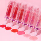 Complete 3 piece lip plumping booster set displayed with outer box