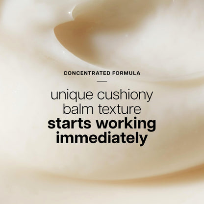 Close up of Philosophy balm creamy formula.