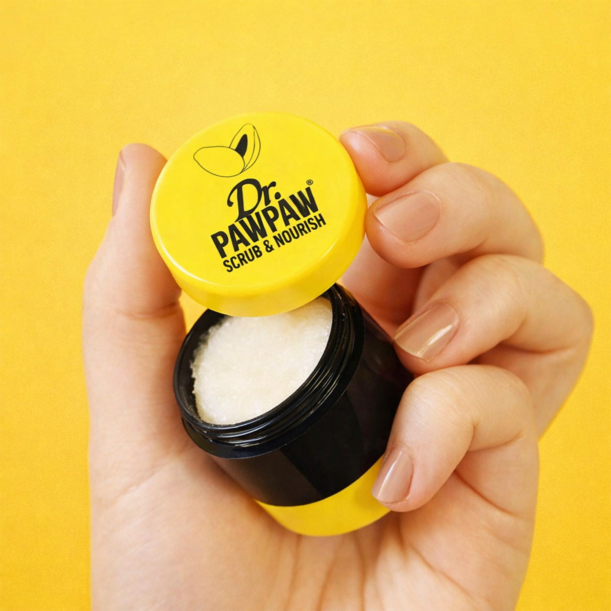Dr. PawPaw lip scrub open container showing sugar texture