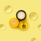 Close-up texture view of the hydrating pawpaw and olive oil lip balm.