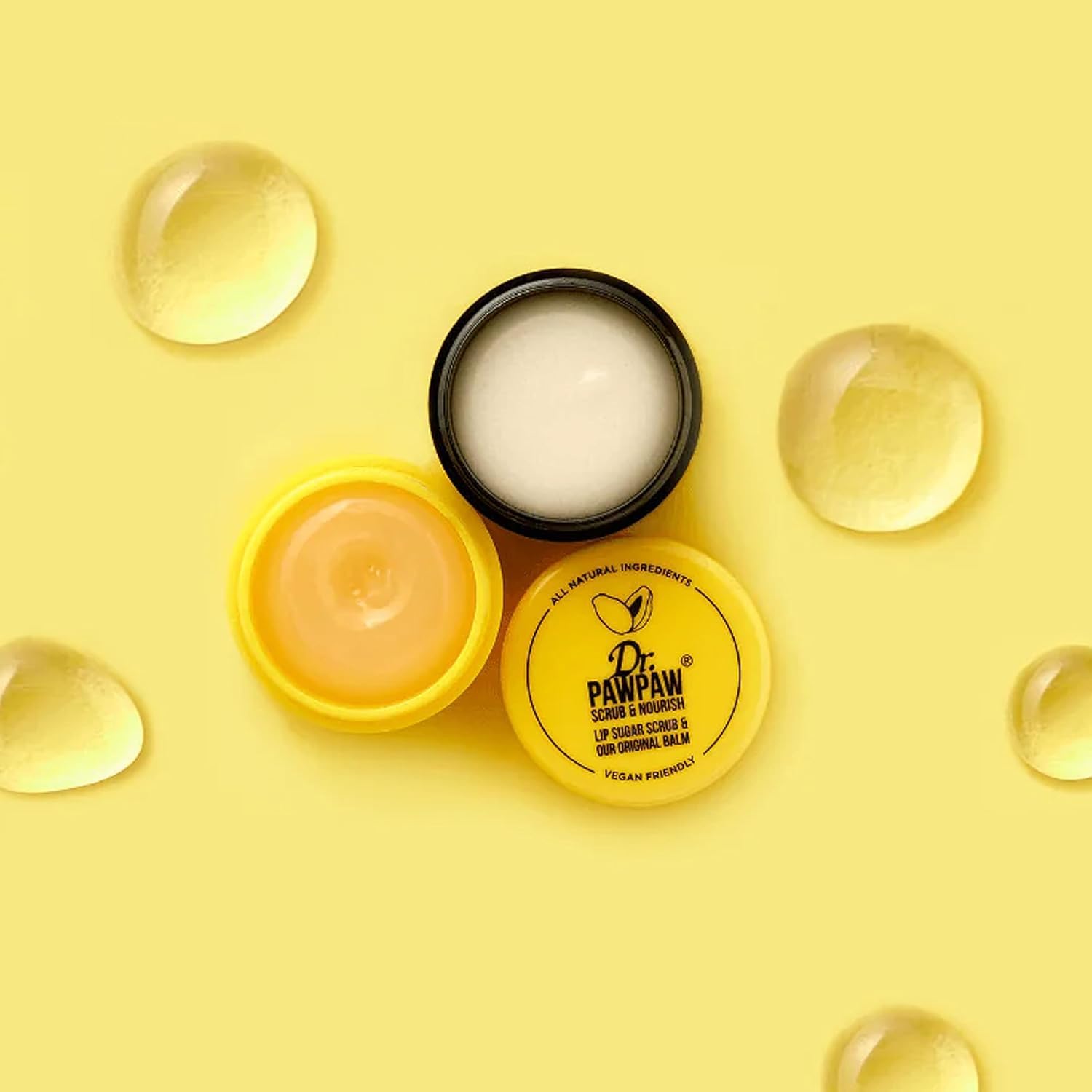 Dr. PawPaw lip care duo being applied to lips