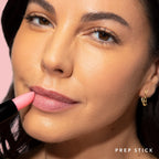 Close-up of Laura Geller sugar lip scrub stick texture
