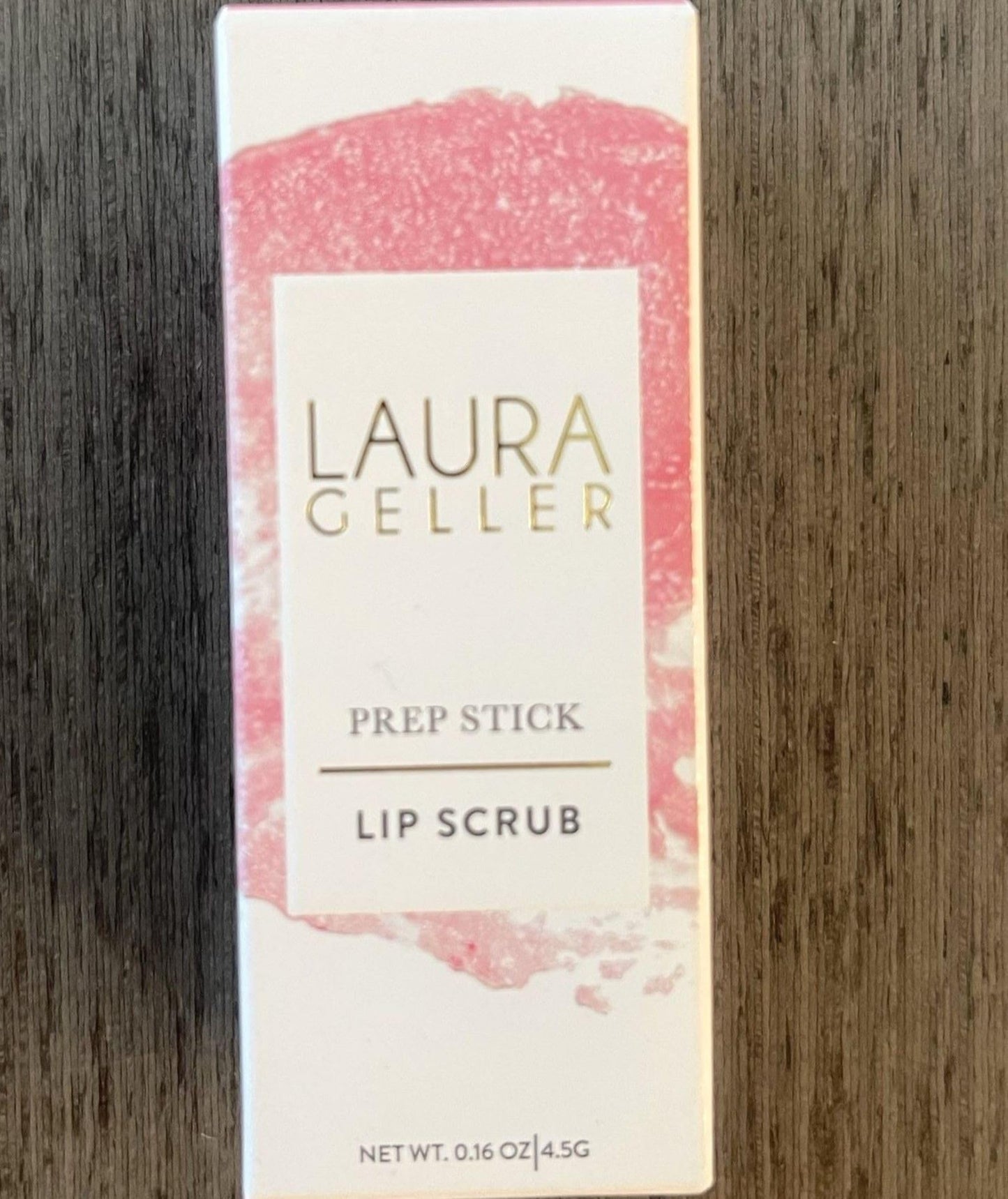 Detailed view of the dual-ended Laura Geller lipstick prep tool