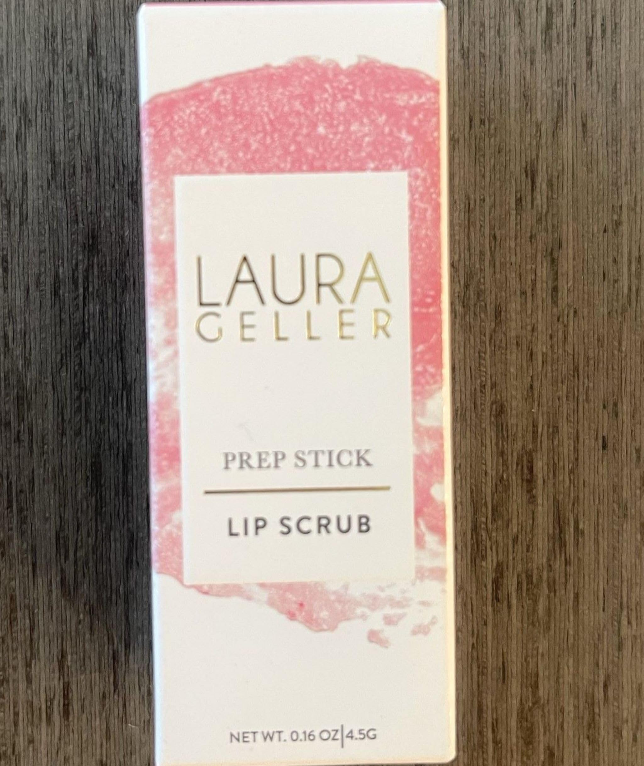Detailed view of the dual-ended Laura Geller lipstick prep tool