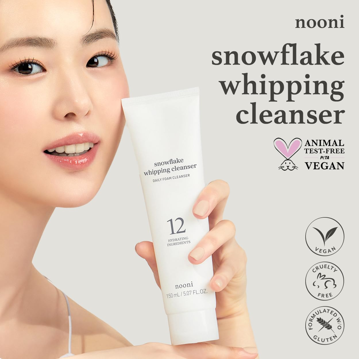 NOONI foaming facial wash texture turning from cream into rich marshmallow fluff