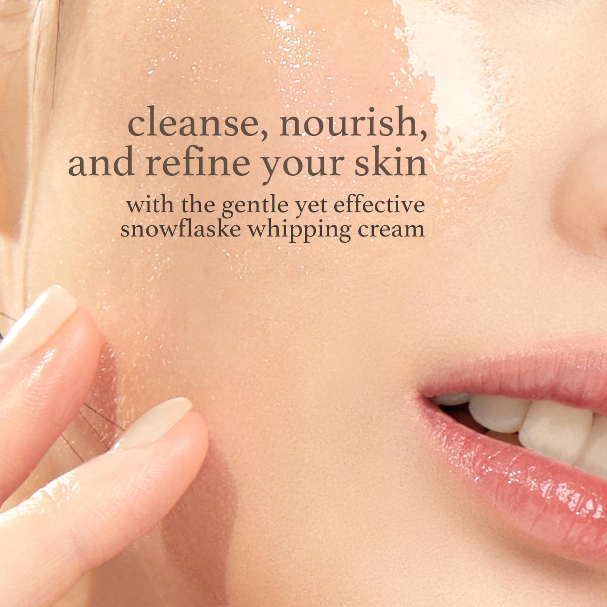 Daily moisturizing whipped face wash tube being squeezed onto wet hands