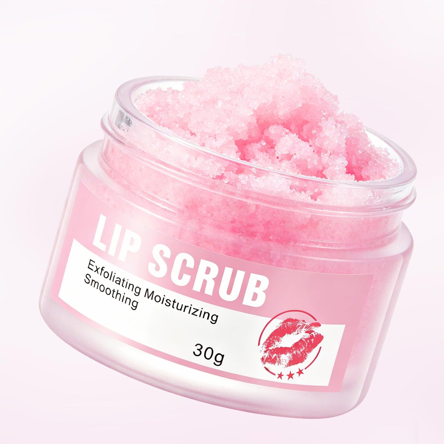 Person applying Oupeicharm lip scrub using the brush