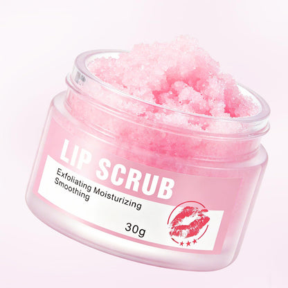 Person applying Oupeicharm lip scrub using the brush