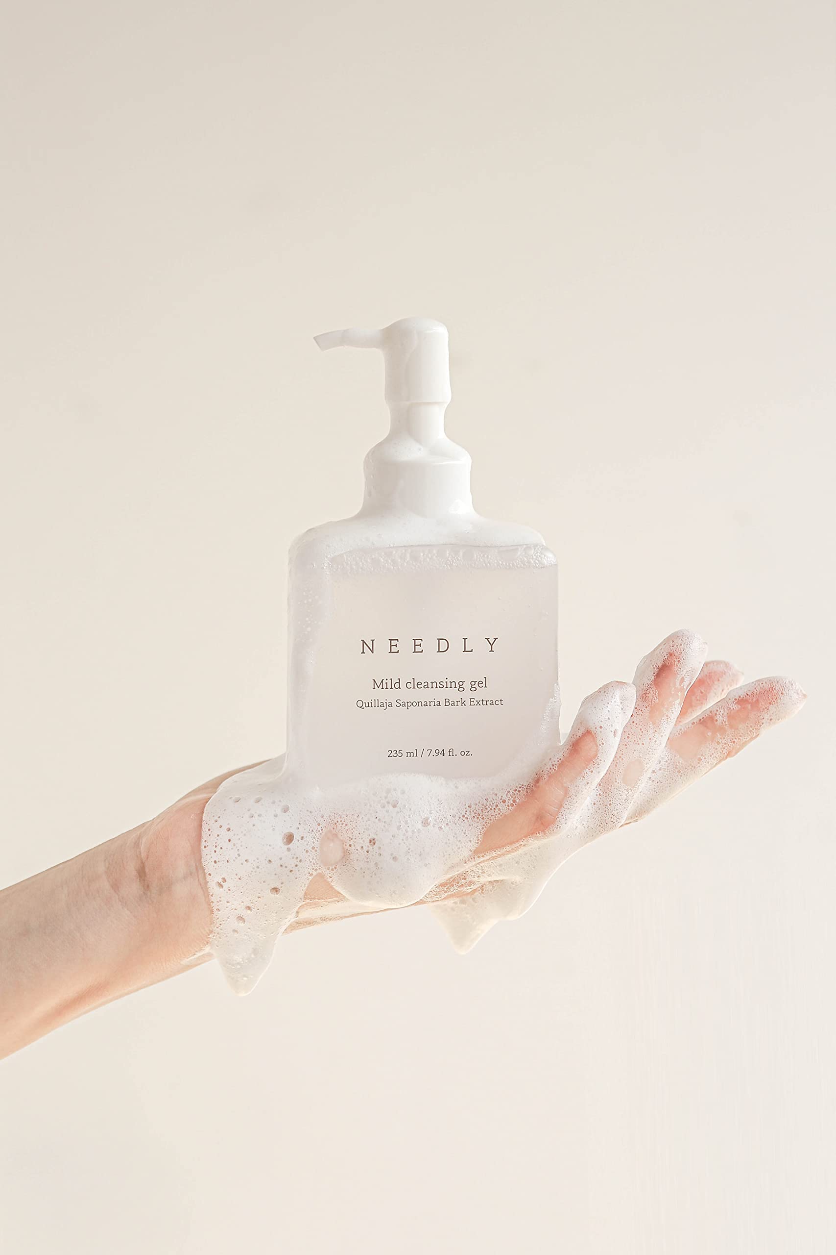 Needly low pH daily face wash bottle showing ingredients and botanical extracts