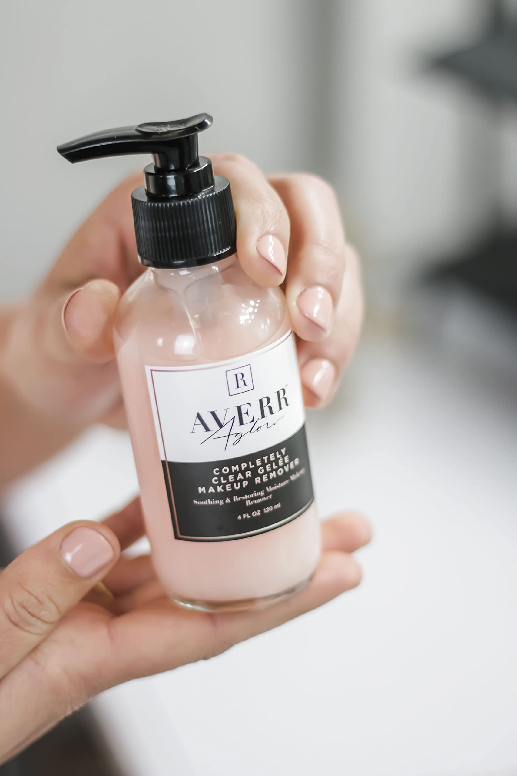 Averr Aglow premium botanical skincare bottle standing upright with pump mechanism