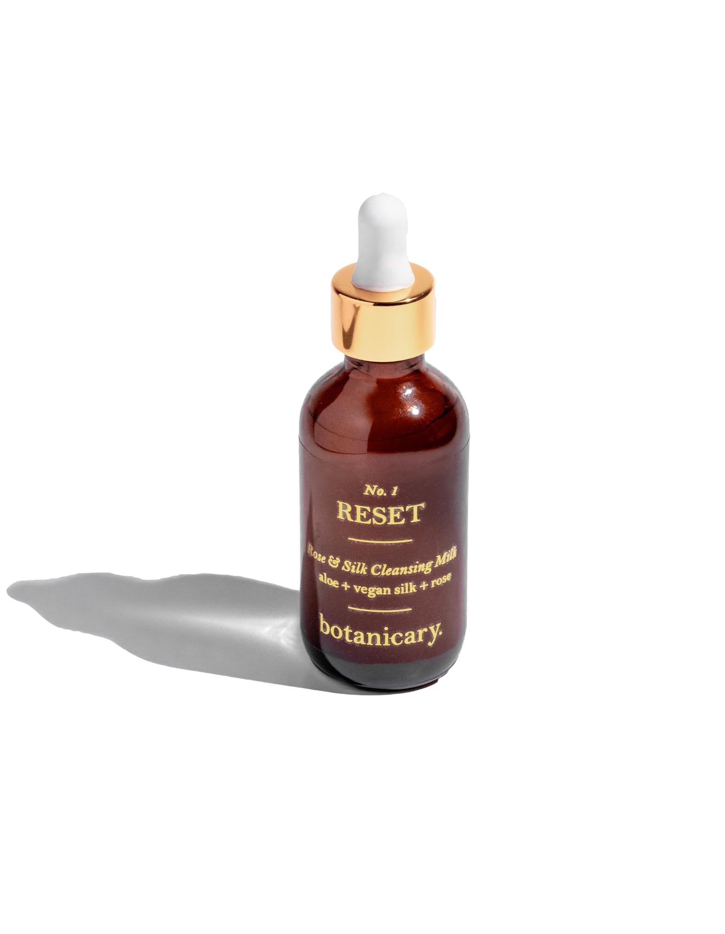 Botanicary cleansing milk in amber bottle