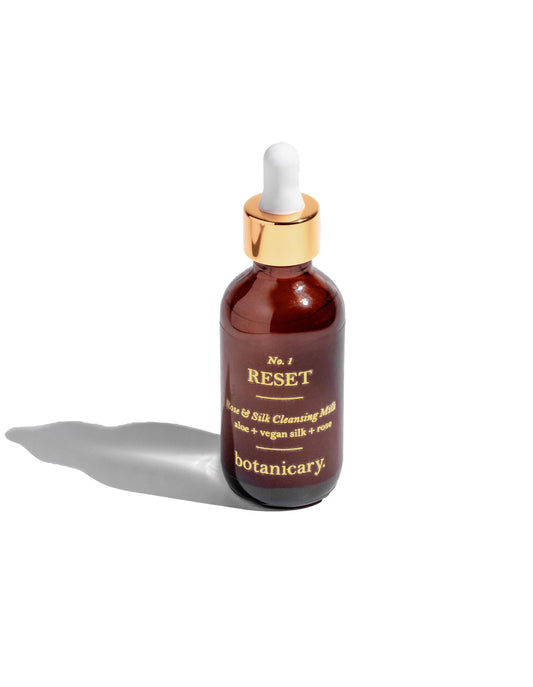 Botanicary cleansing milk in amber bottle
