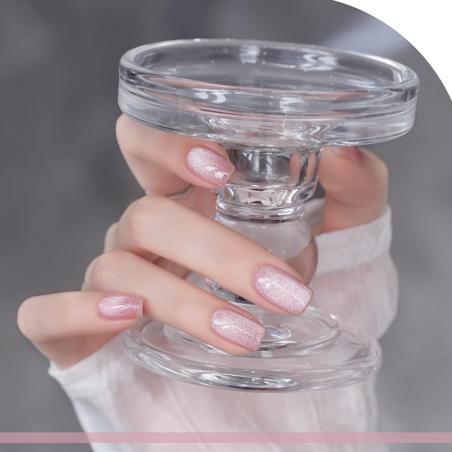 Dazzling Pink cat eye gel polish applied on almond shaped nails