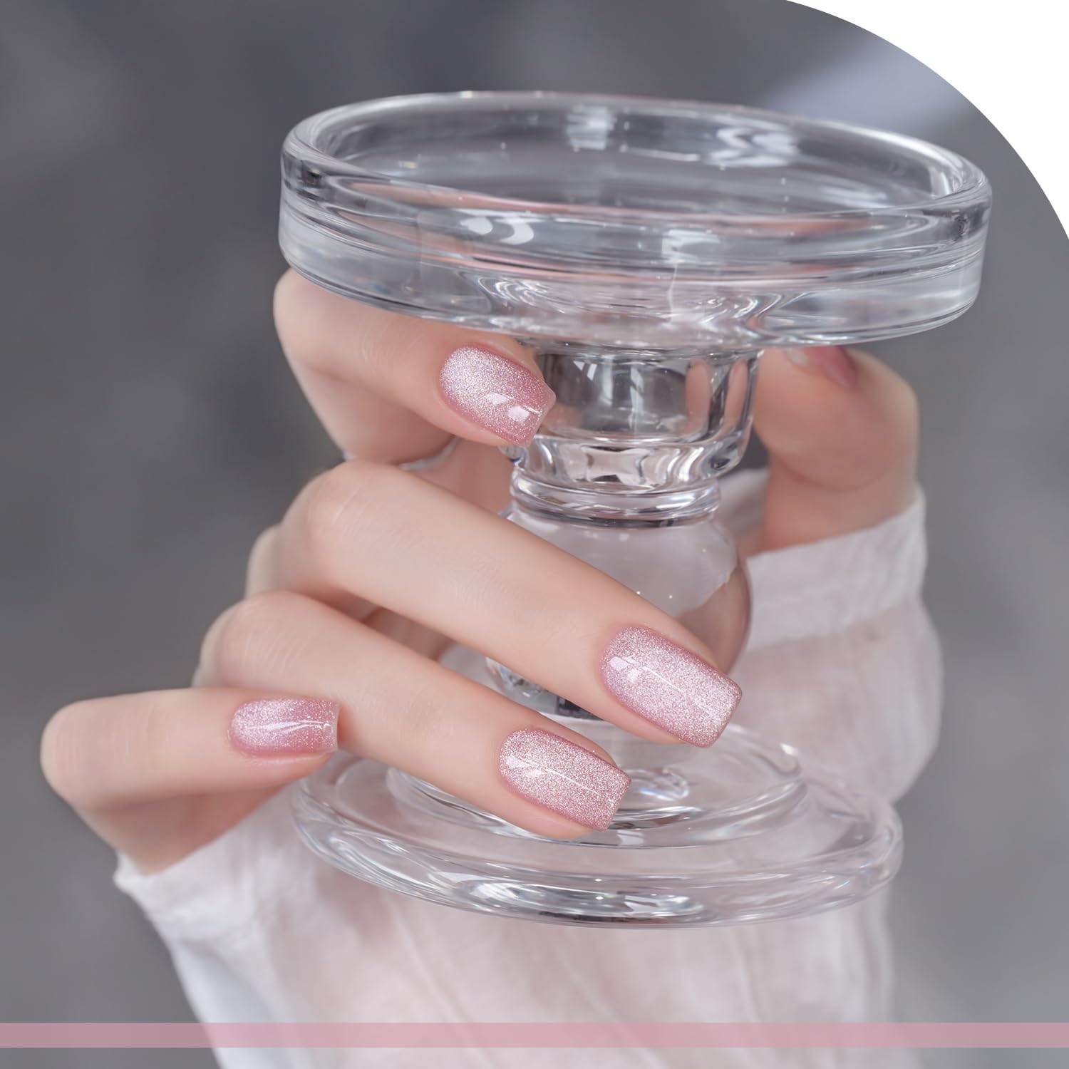 Dazzling Pink cat eye gel polish applied on almond shaped nails