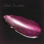 Manicure hand showcasing finished pink cat eye gel nails under studio lighting