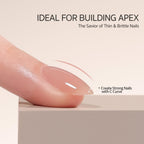 Manicured soft almond nails showing sheer nude pink finish