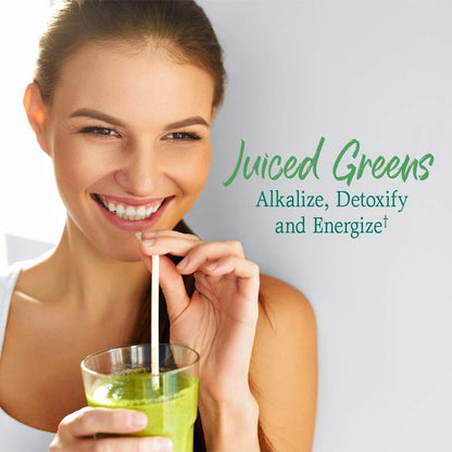 Scooping green juice powder out of the original stevia-free 30 servings container