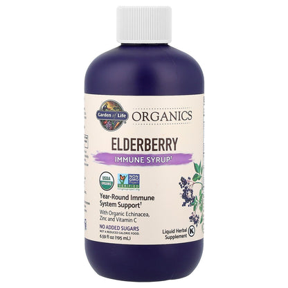 Garden of Life Sambucus elderberry immune syrup bottle with the included serving cup visible.