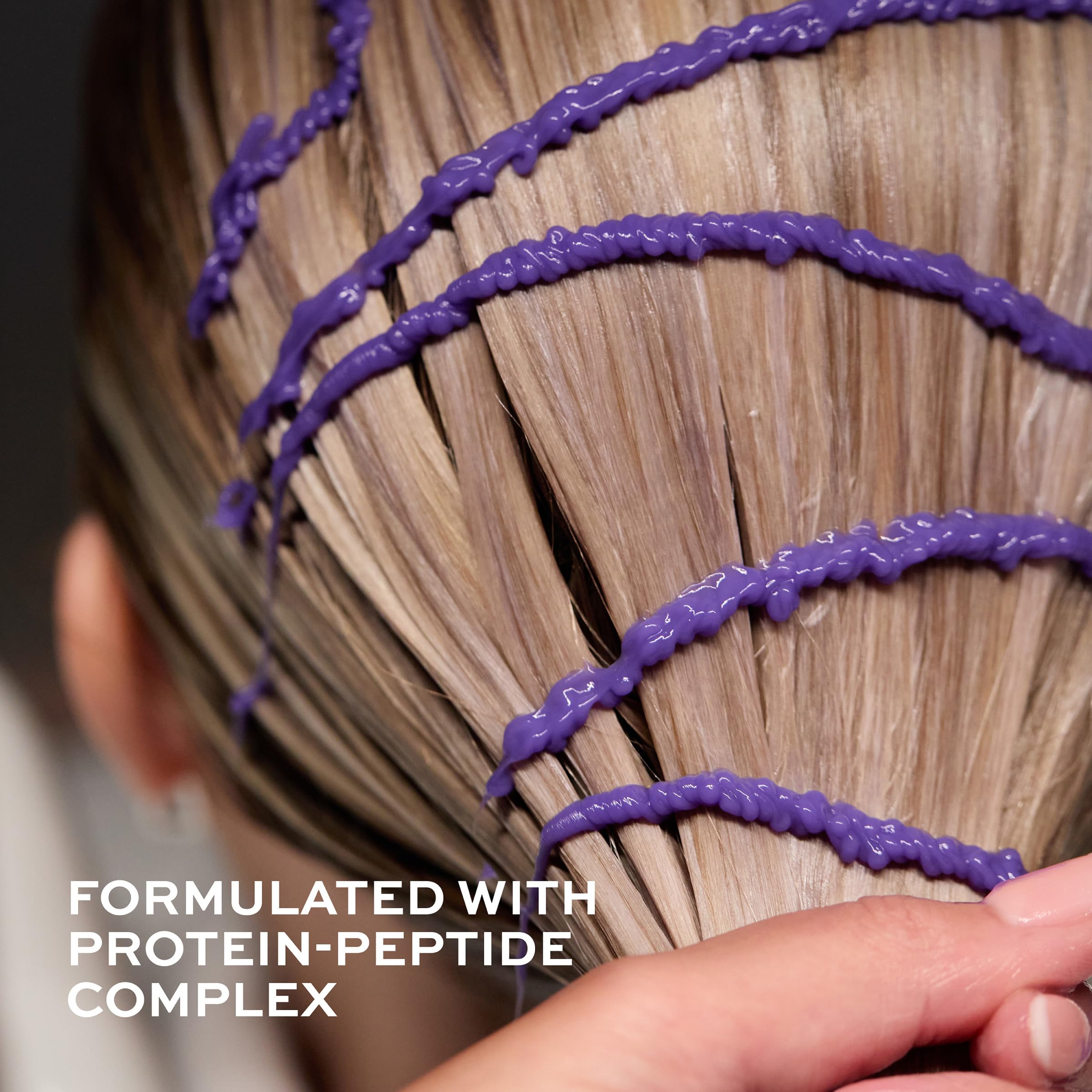 Close up of John Frieda blonde hair treatment tube