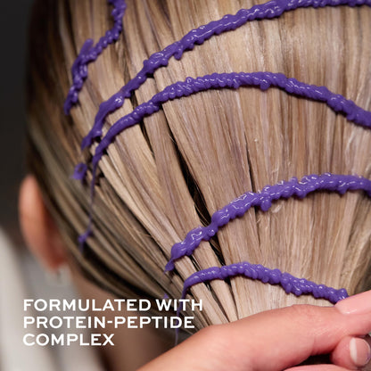 Close up of John Frieda blonde hair treatment tube