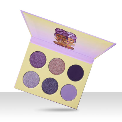 Group shot of Juvia's Place The Violets palette with professional makeup brushes